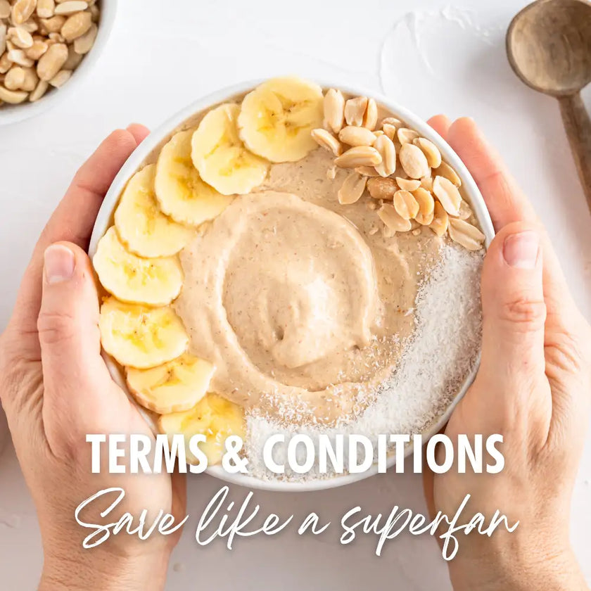 Banana smoothie bowl with peanut butter and bananas, white ceramic bowl.