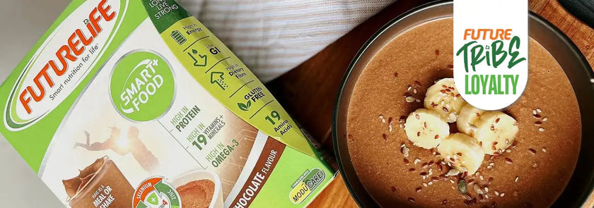 A box of futurelife smart food chocolate-flavored protein powder with green and white packaging, featuring a label that highlights its 19g protein content.