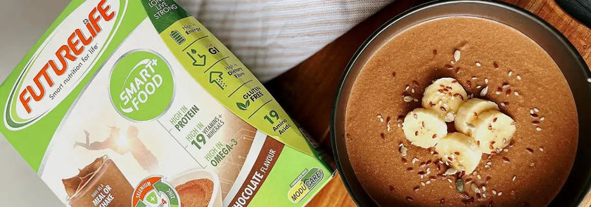 Chocolate protein shake bowl with banana slices and nuts, futurelife brand.