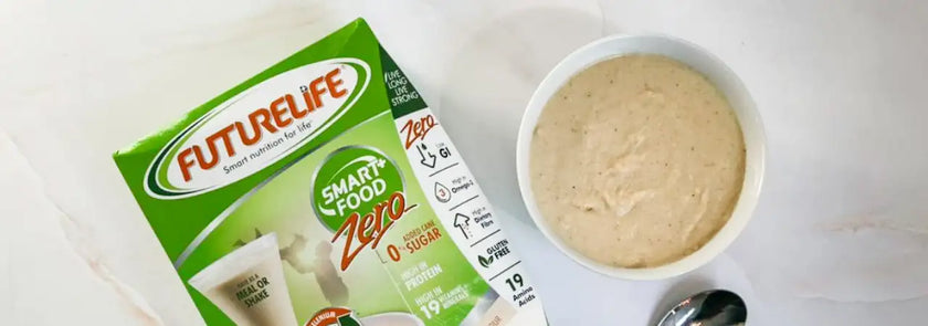 Futurelife zero protein powder in a creamy beige bowl with spoon.