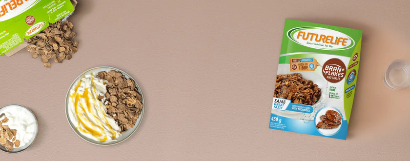 Green and blue futurelife bran flakes cereal box with a picture of the flakes on its front.