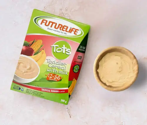 Green and pink futurelife tots toddler cereal box with tropical banana flavor, 500g.