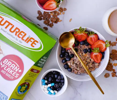 Green and white futurelife bran flakes cereal box with a pink circular logo.