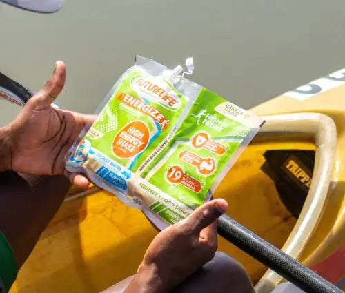 Green and white packaged nature’s energy high-energy bars, each individually wrapped in a resealable pouch with nutritional information printed on the front.