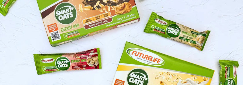 Green and white smart oats energy bar packaging with a peanut butter chocolate flavor, featuring an image of oats and nuts on the front.