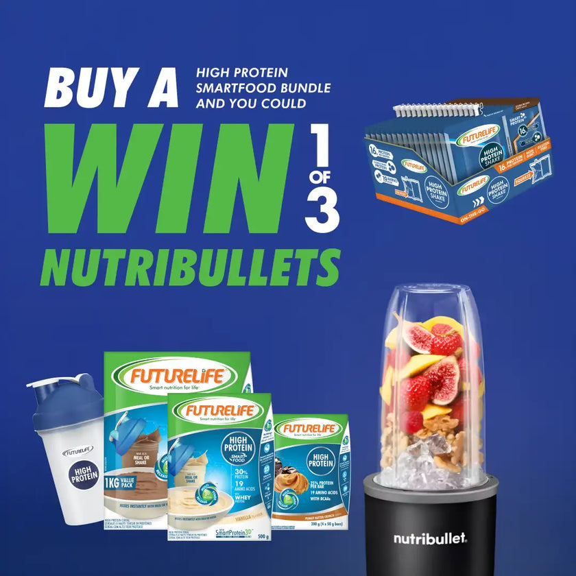 Nutribullet blender with colorful fruit and ice inside, black base, white label, silver accents.