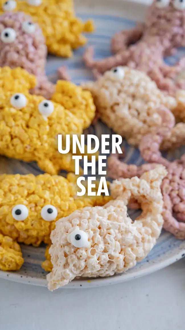 Rice crispy sea creatures in various colors and designs, including googly eyes for a playful touch.