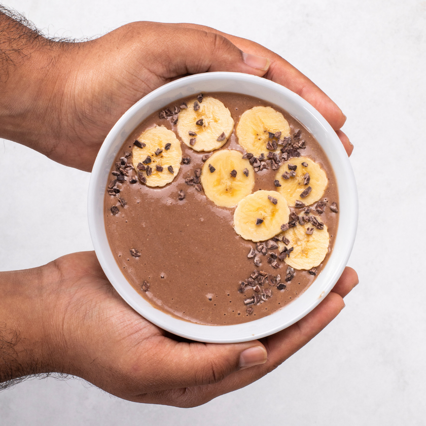 Smart food™ Chocolate Smoothie Bowl with Banana Slices and Chia Seeds